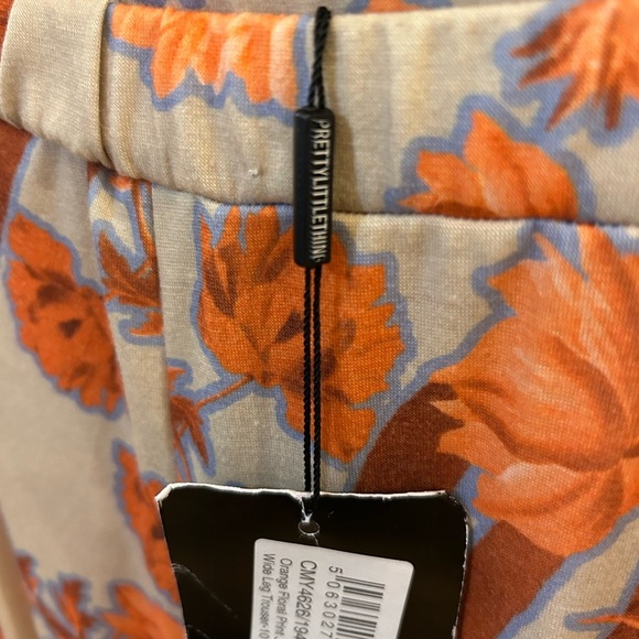 NWT- PrettyLittleThing orange floral print wide-leg pants. - Picture 8 of 8